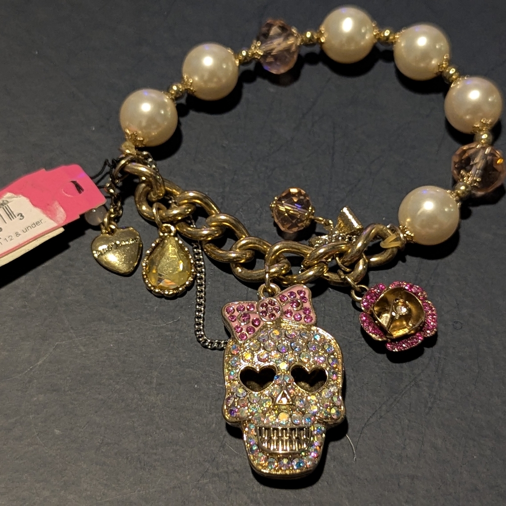 Betsey Johnson Gold and Pink Skull Charm Bracelet